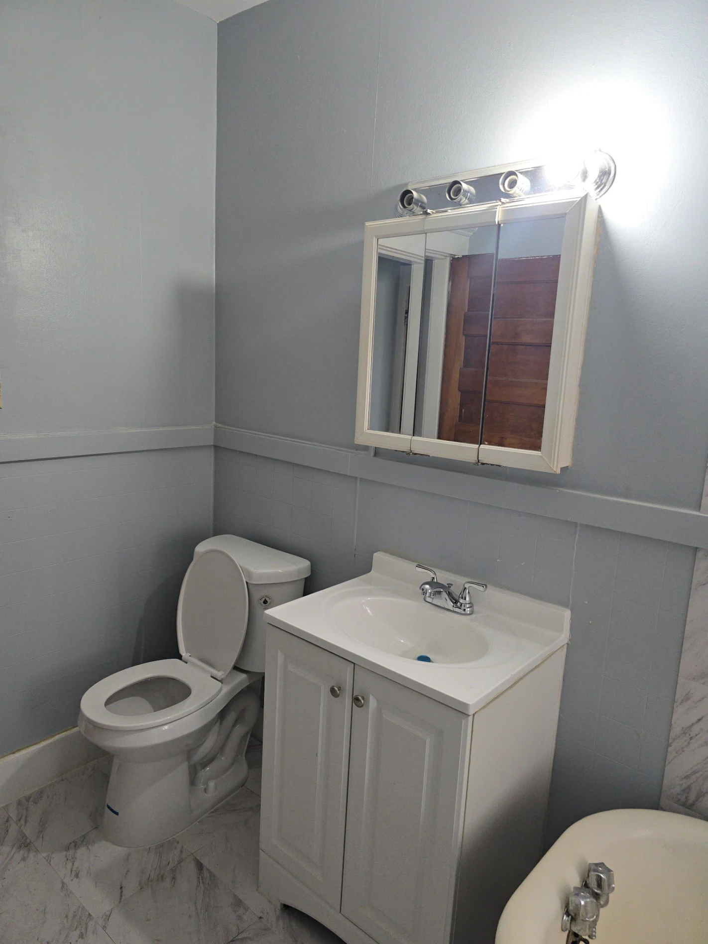 Dark tile master bathroom with black subway tile shower — Homerix Inc Noblesville Indiana